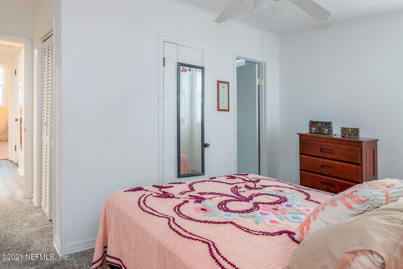 754 Old Hickory Road Jacksonville, FL 32207 - Photo 13 of 21 a bedroom with a bed and a dresser