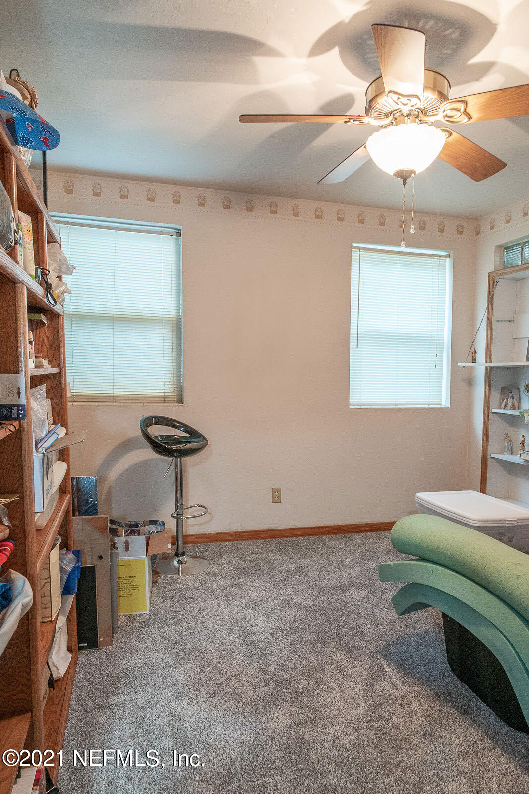 754 Old Hickory Road Jacksonville, FL 32207 - Photo 15 of 21 a room with lots of furniture and a window