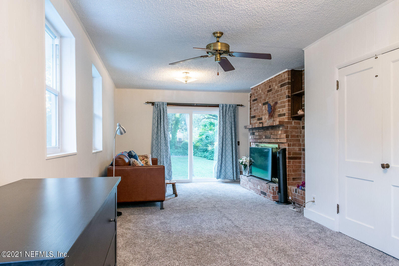 754 Old Hickory Road Jacksonville, FL 32207 - Photo 16 of 21 a living room with furniture and a fireplace
