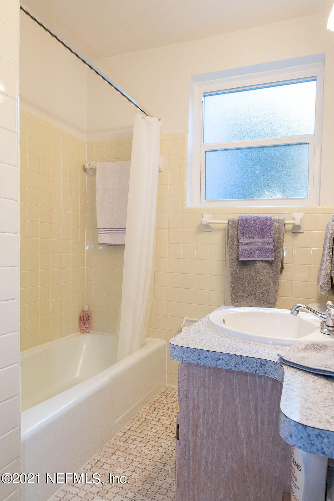 754 Old Hickory Road Jacksonville, FL 32207 - Photo 18 of 21 a bathroom with a sink and a mirror