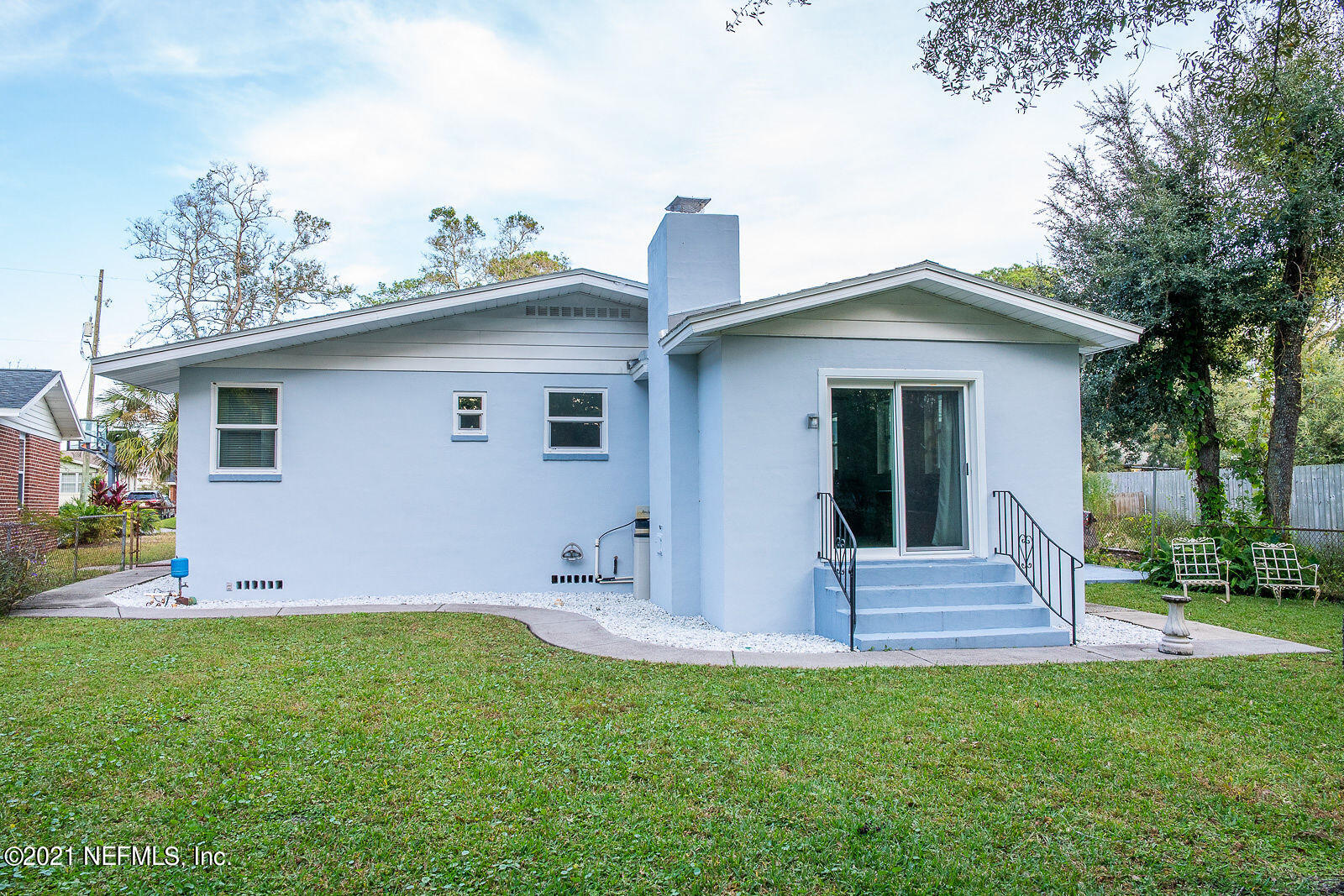 754 Old Hickory Road Jacksonville, FL 32207 - Photo 20 of 21 a front view of house with yard and outdoor seating