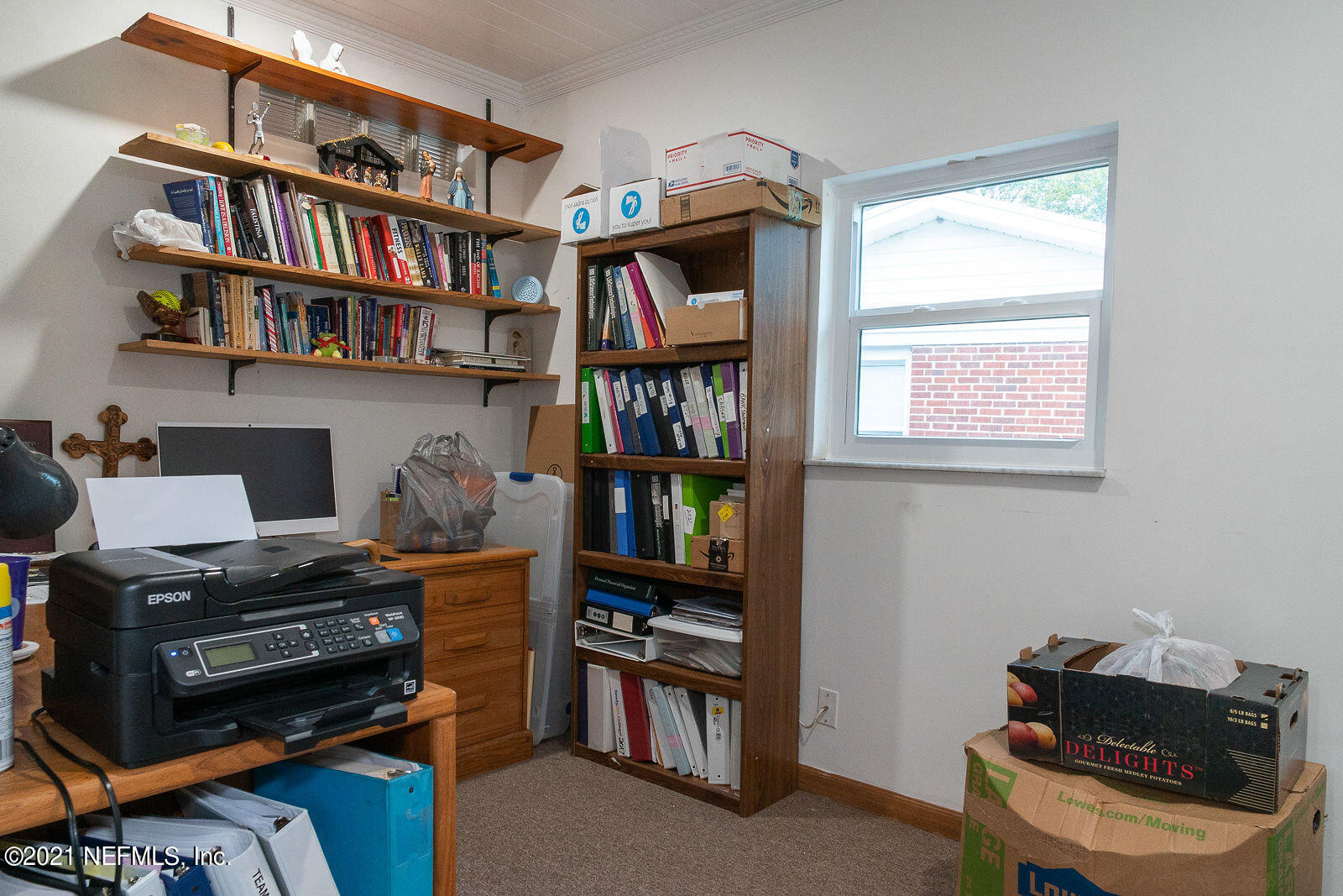 754 Old Hickory Road Jacksonville, FL 32207 - Photo 9 of 21 a room with a book shelf and a window