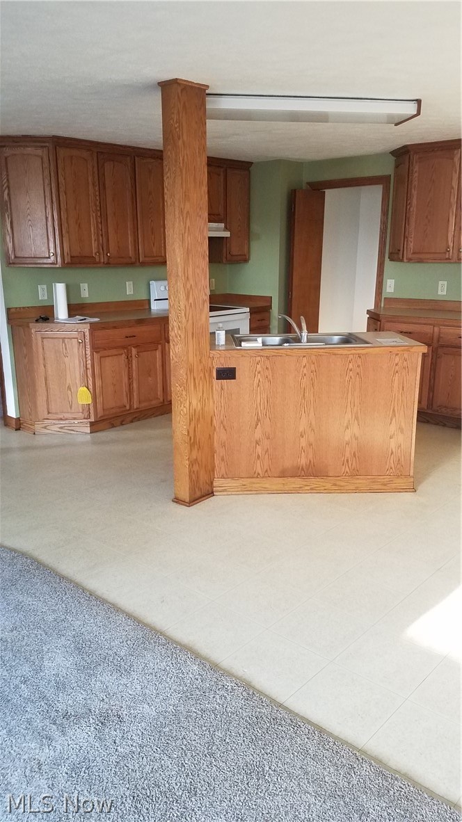 14213 Ellett Road Beloit, OH 44609 - Photo 9 of 16 living room & kitchen