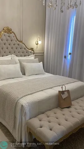 a bathroom with a couch and mirror