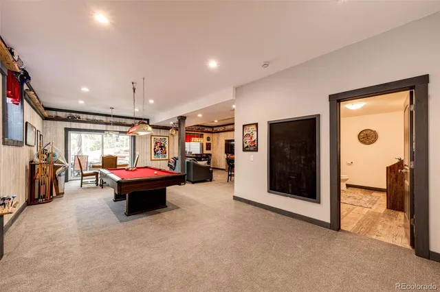 a view of a bathroom with a sink and mirror