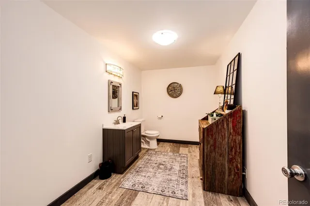 a living room with lots of furniture and a flat screen tv