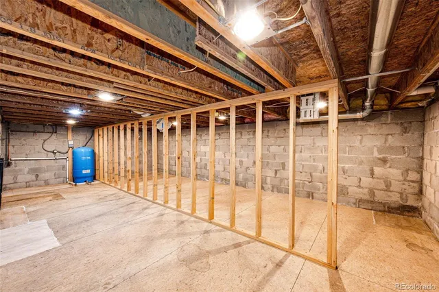 a backyard of house with large trees