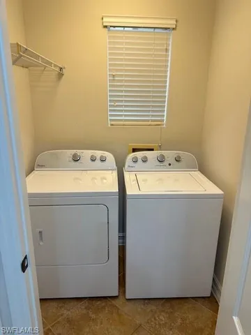 a bathroom with a sink toilet and mirror