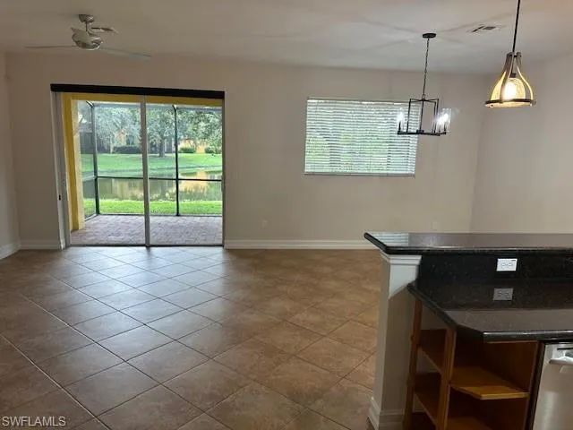 a view of a livingroom with furniture and window