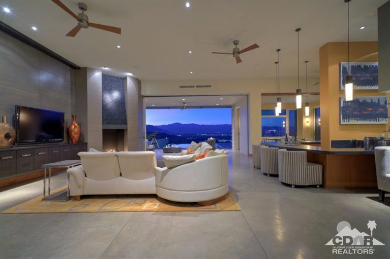10 Rockcrest Rancho Mirage, CA 92270 - Photo 14 of 32 a living room with furniture and a flat screen tv