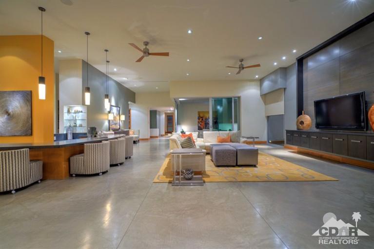 10 Rockcrest Rancho Mirage, CA 92270 - Photo 15 of 32 a living room with furniture and a flat screen tv