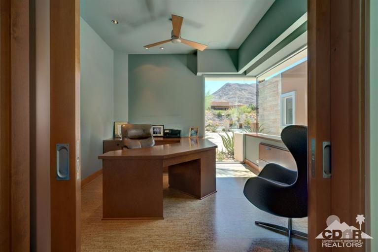 10 Rockcrest Rancho Mirage, CA 92270 - Photo 23 of 32 a dining room with furniture and a floor to ceiling window