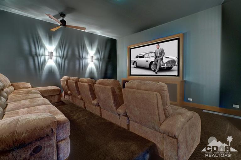 10 Rockcrest Rancho Mirage, CA 92270 - Photo 24 of 32 a living room with furniture and a painting on the wall