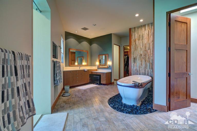 10 Rockcrest Rancho Mirage, CA 92270 - Photo 27 of 32 a bathroom with a sink and a mirror
