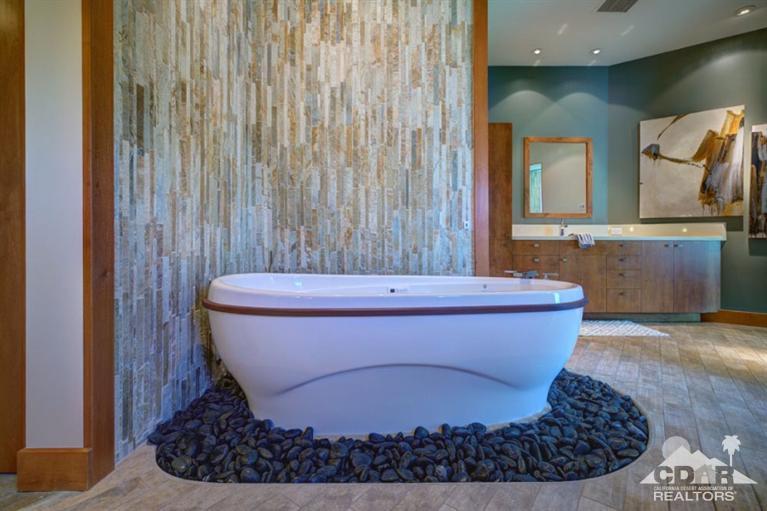 10 Rockcrest Rancho Mirage, CA 92270 - Photo 28 of 32 a bathroom with a bathtub and a sink
