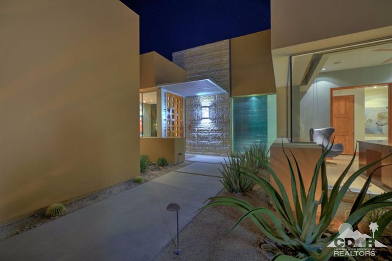 10 Rockcrest Rancho Mirage, CA 92270 - Photo 7 of 32 a view of entryway and hall with wooden floor