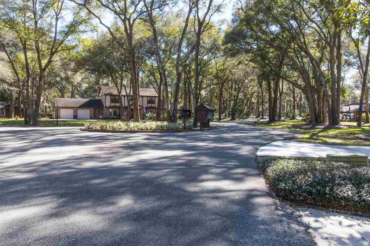 4200 Wicks Branch Road St. Augustine, FL 32086 - Photo 25 of 25 a house with trees in front of it
