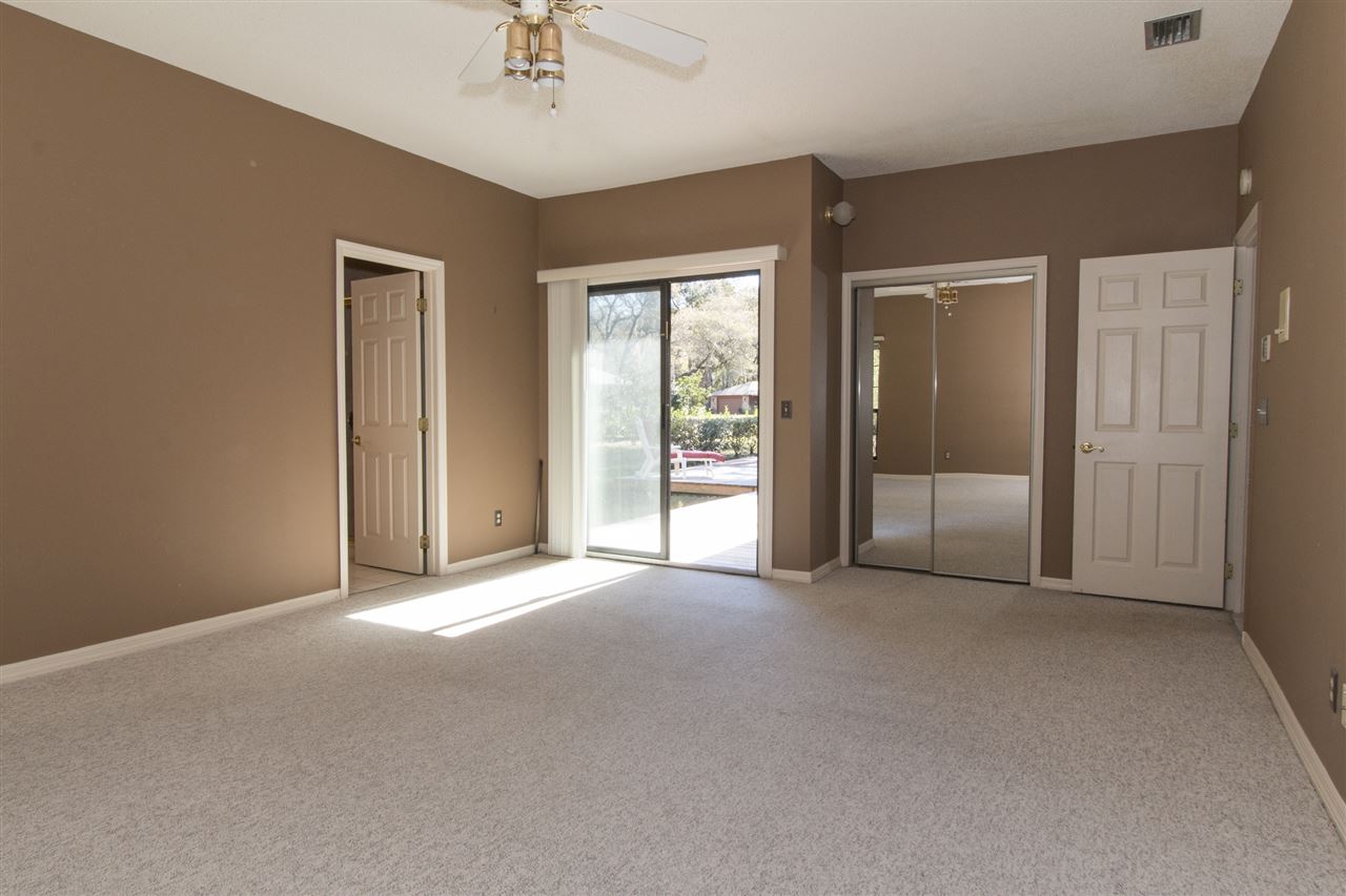 4200 Wicks Branch Road St. Augustine, FL 32086 - Photo 8 of 25 a view of an empty room with glass door