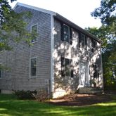 a backyard of a house with lots of green space