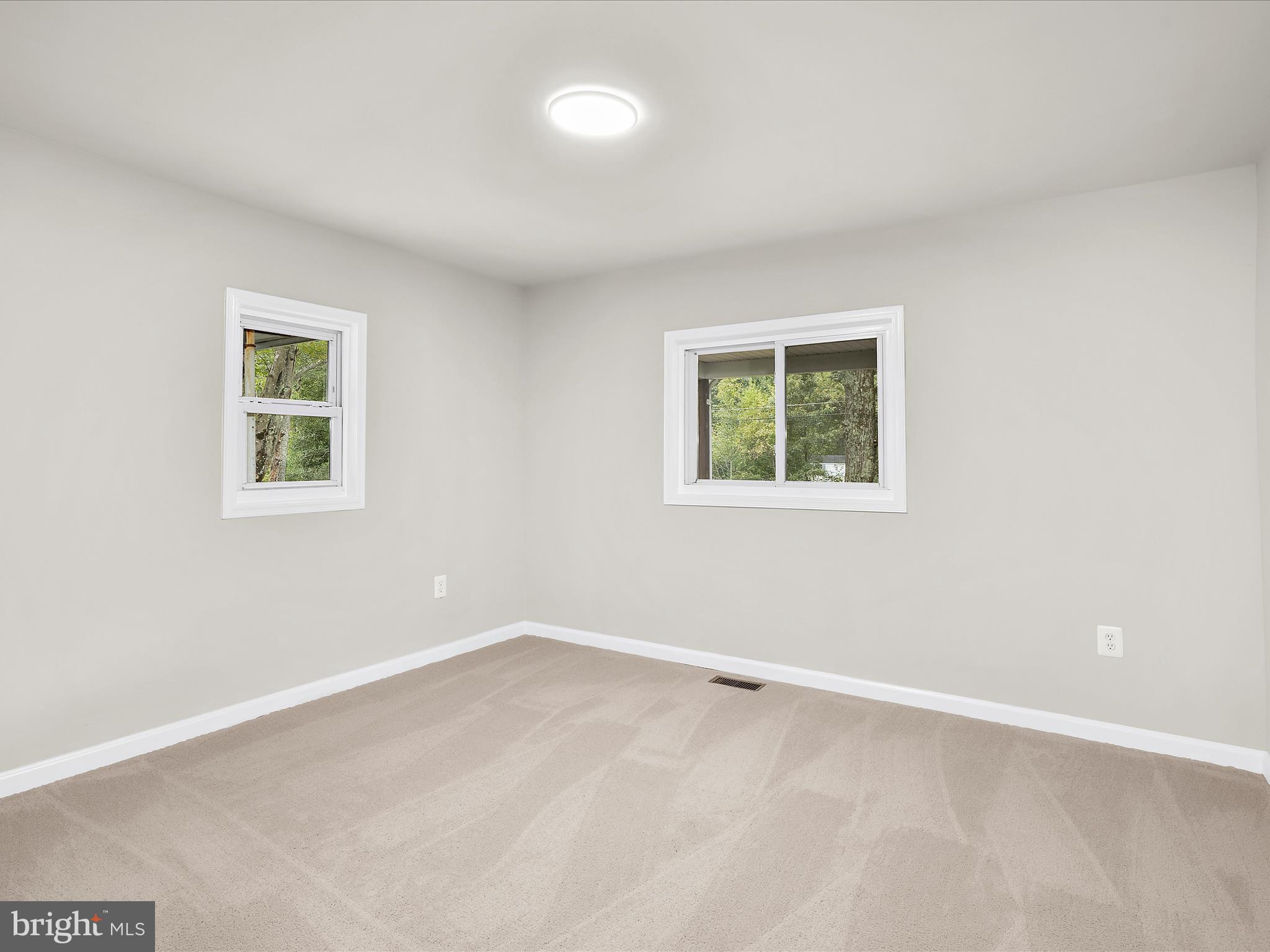 5660 New Cut Road Marbury, MD 20658 - Photo 16 of 38 an empty room with a window