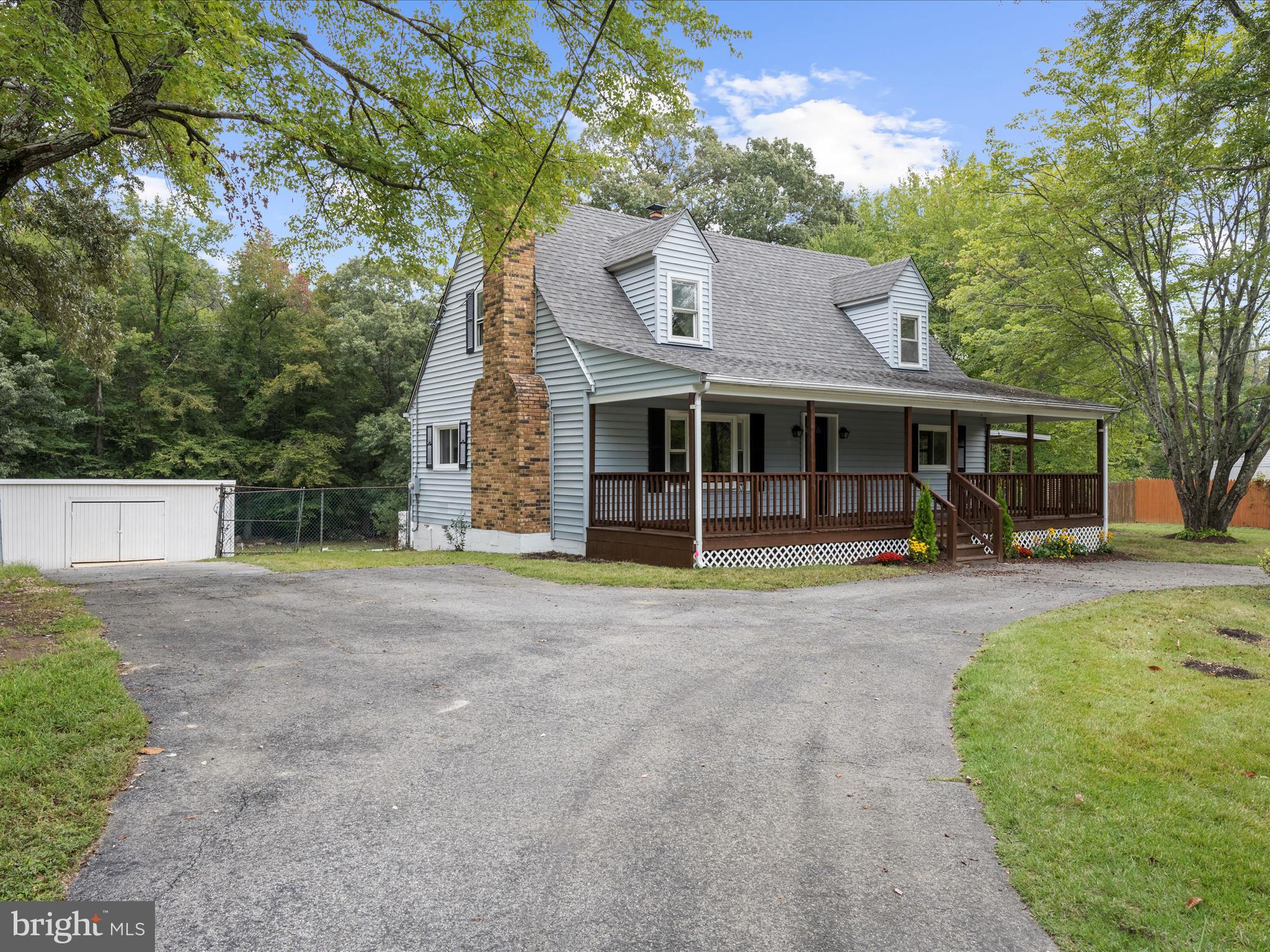 5660 New Cut Road Marbury, MD 20658 - Photo 2 of 38 a view of a house with a yard and large tree