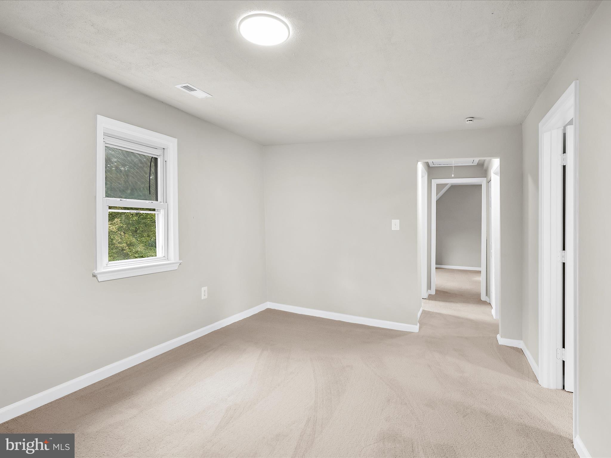 5660 New Cut Road Marbury, MD 20658 - Photo 21 of 38 an empty room with a window