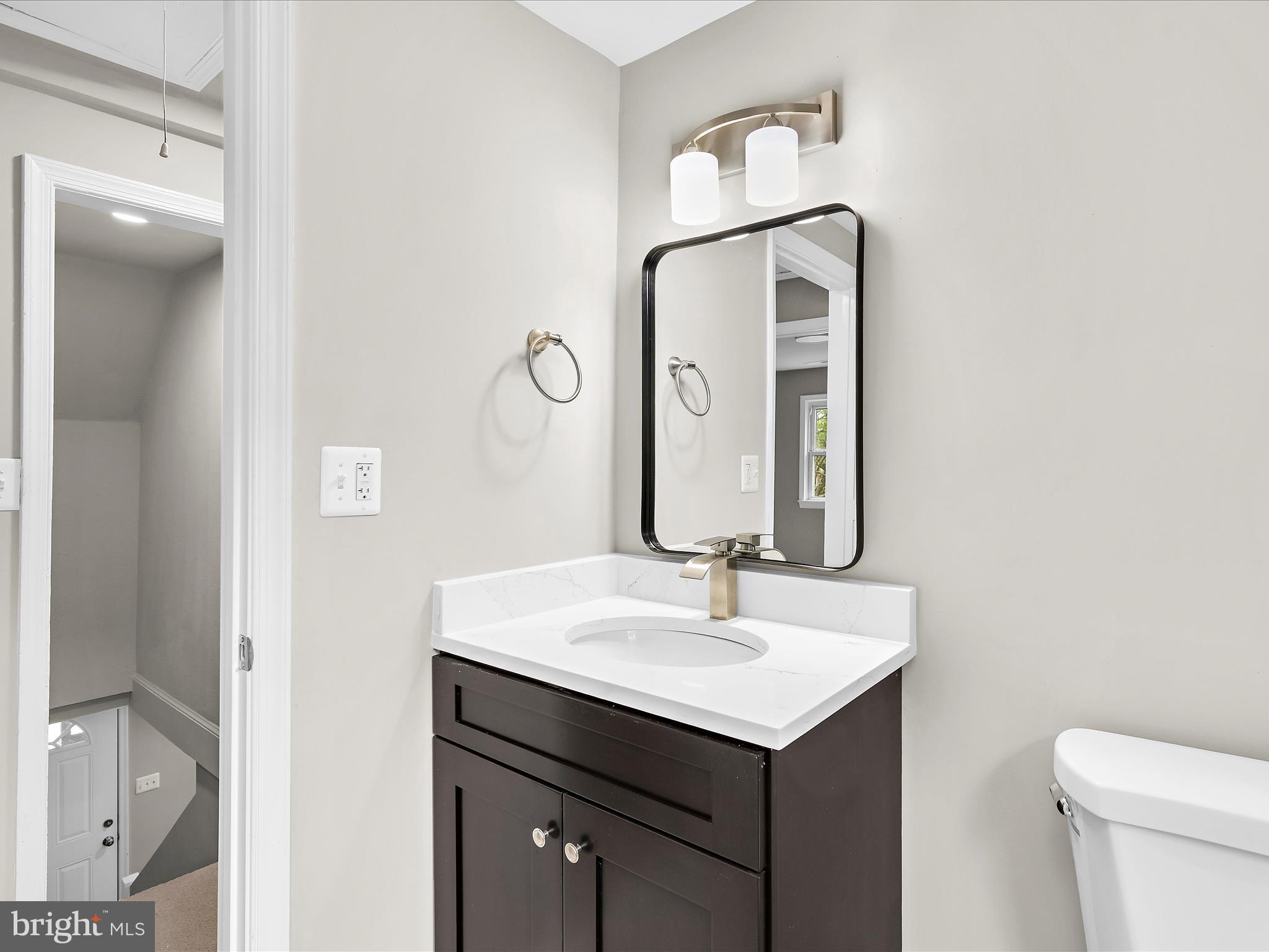 5660 New Cut Road Marbury, MD 20658 - Photo 23 of 38 a bathroom with a sink and a mirror