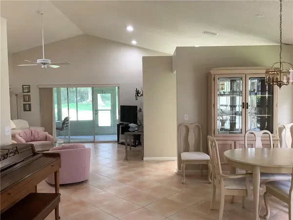 a living room with furniture and window