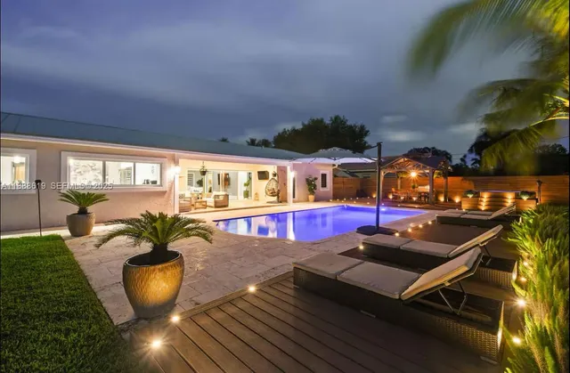 a garden with palm trees