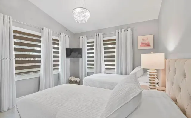 a bedroom with a bed and a closet