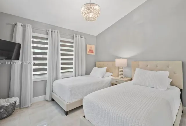 a living room with furniture and a toilet