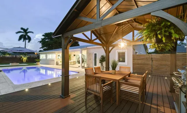 a view of a swimming pool with lounge chair