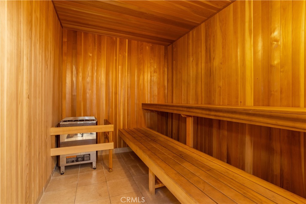 13331 Moorpark Street, Unit 319 Sherman Oaks, CA 91423 - Photo 24 of 46 a view of a room with stairs and a wooden furniture
