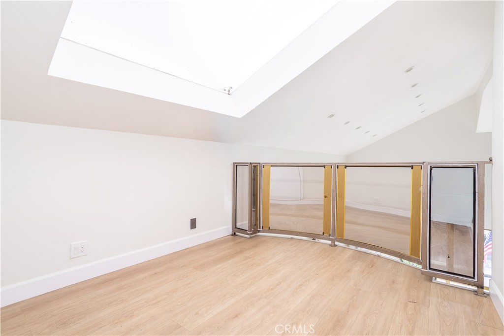 13331 Moorpark Street, Unit 319 Sherman Oaks, CA 91423 - Photo 10 of 46 wooden floor in an empty room