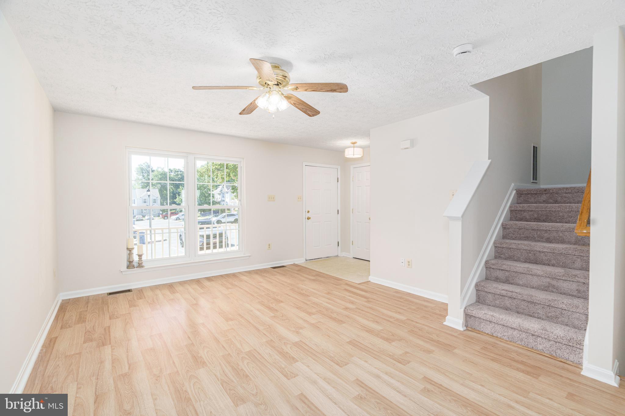 434 Buttonwoods Road Elkton, MD 21921 - Photo 3 of 16 Living room with ceiling fan and large windows