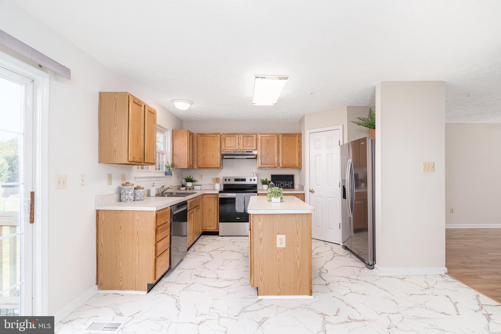 434 Buttonwoods Road Elkton, MD 21921 - Photo 5 of 16 Kitchen with updated floors and new appliances