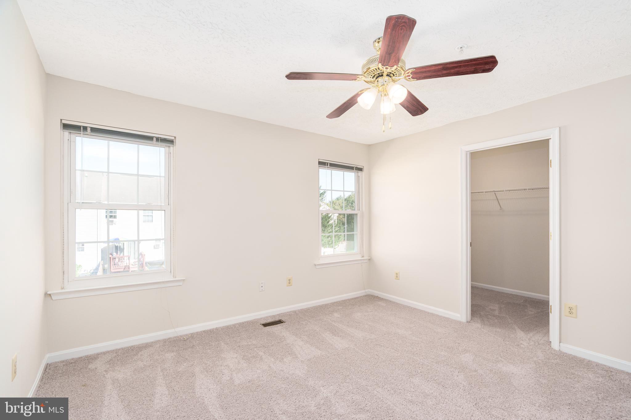 434 Buttonwoods Road Elkton, MD 21921 - Photo 9 of 16 Primary bedroom with walk-in closet and new carpet