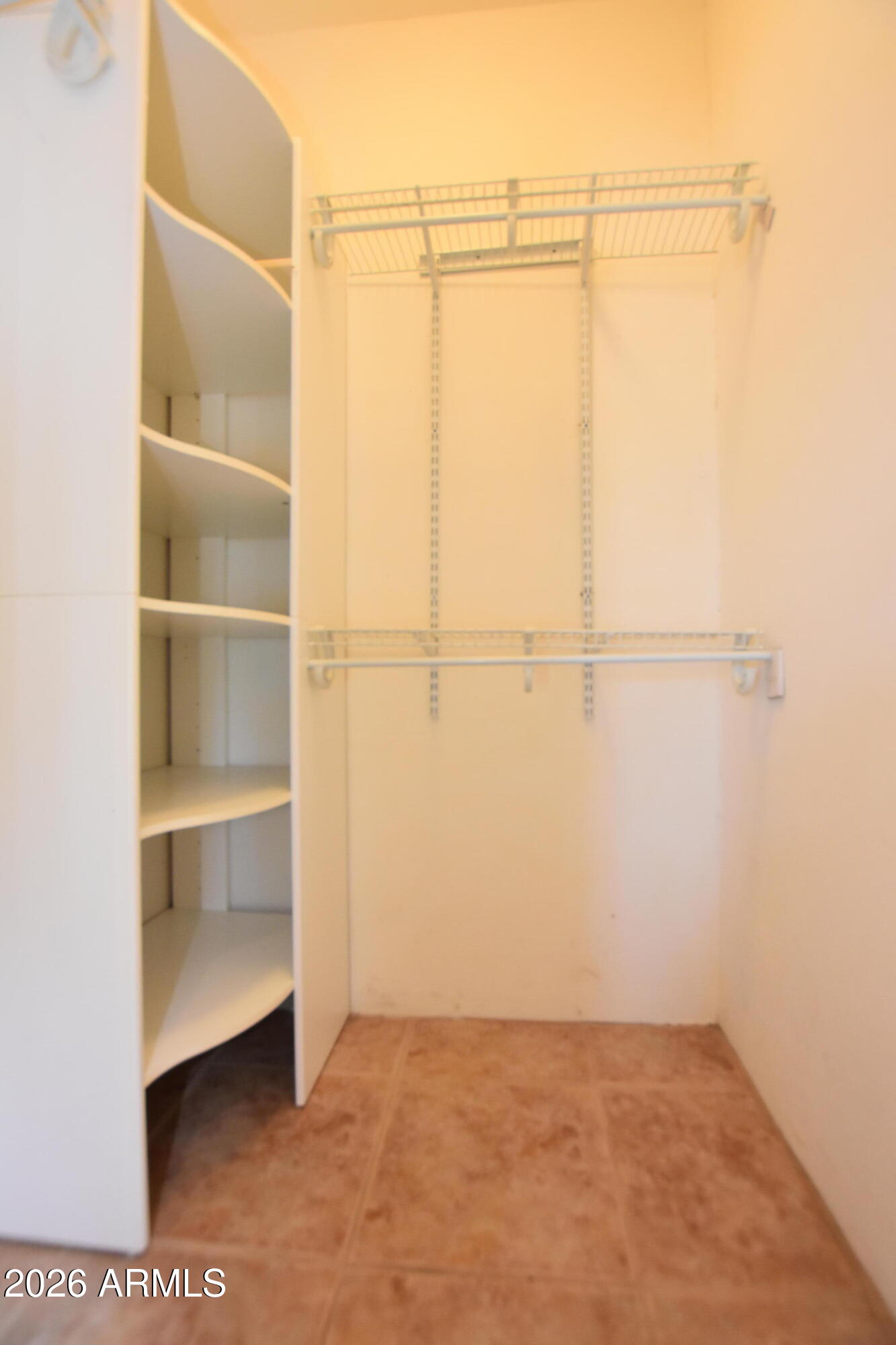 1140 West Briggs Road Ajo, AZ 85321 - Photo 19 of 42 a view of an empty walk in closet