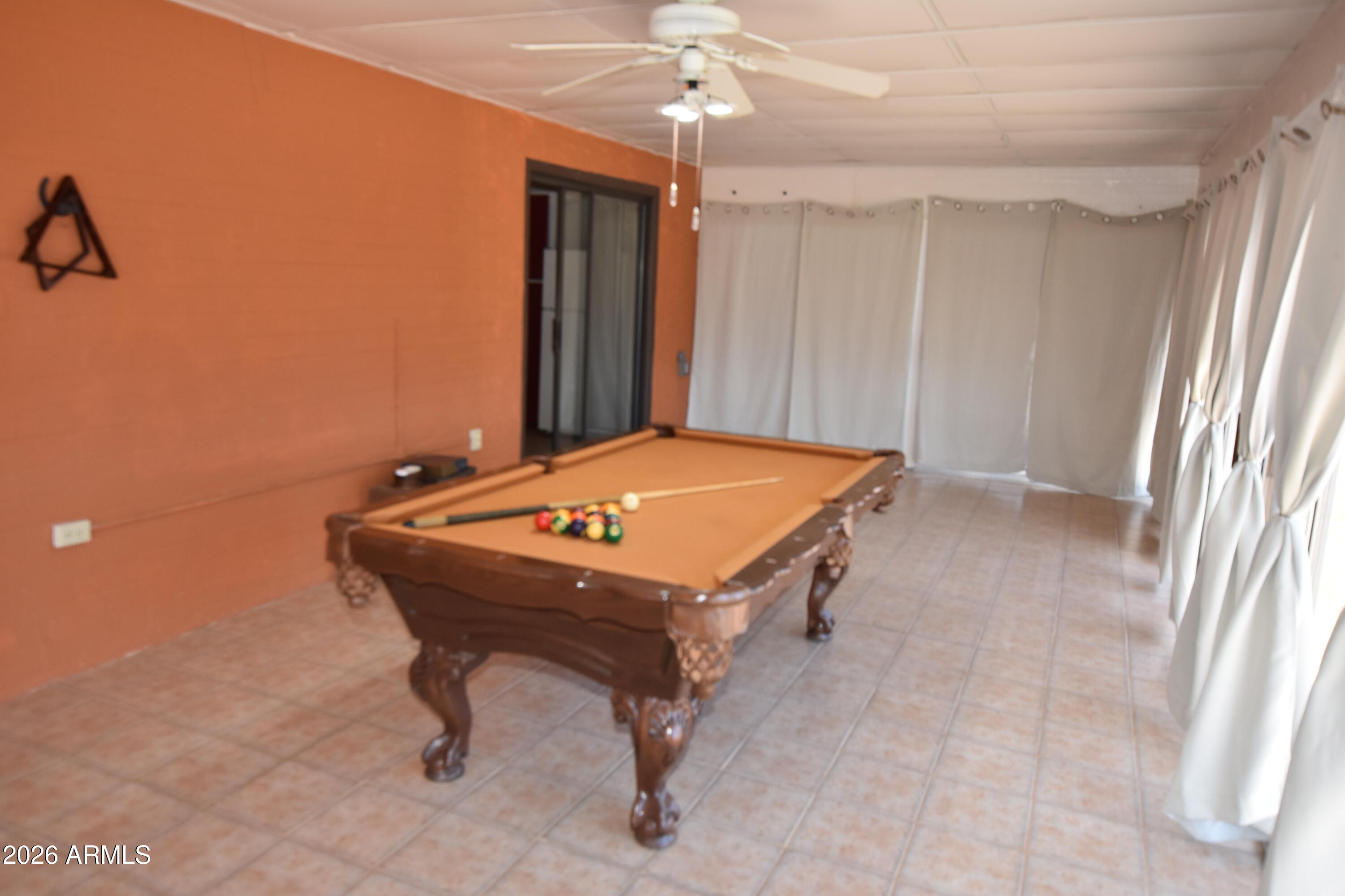 1140 West Briggs Road Ajo, AZ 85321 - Photo 25 of 42 a room with pool table and windows