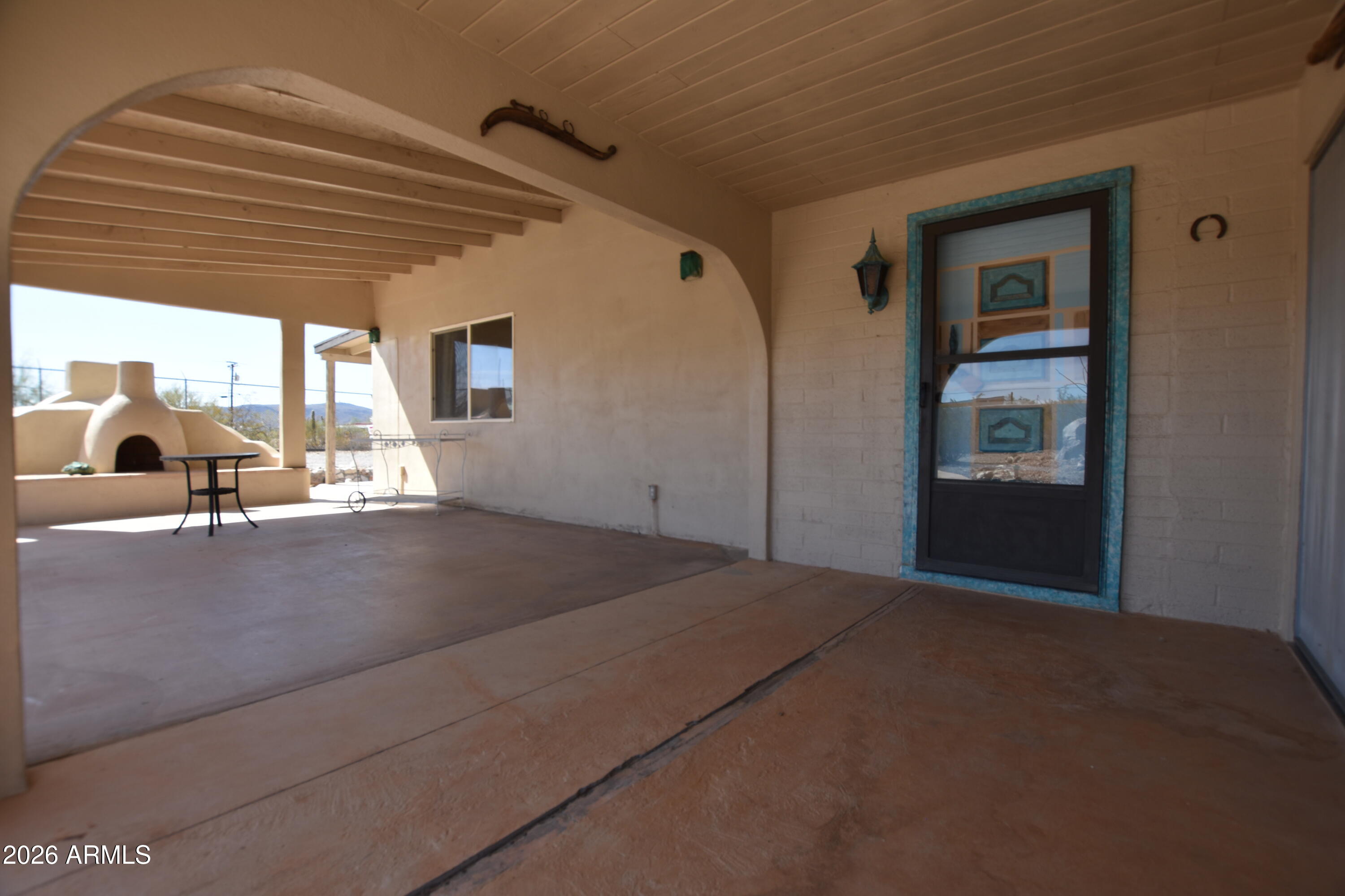 1140 West Briggs Road Ajo, AZ 85321 - Photo 30 of 42 a view of a living room and bedroom
