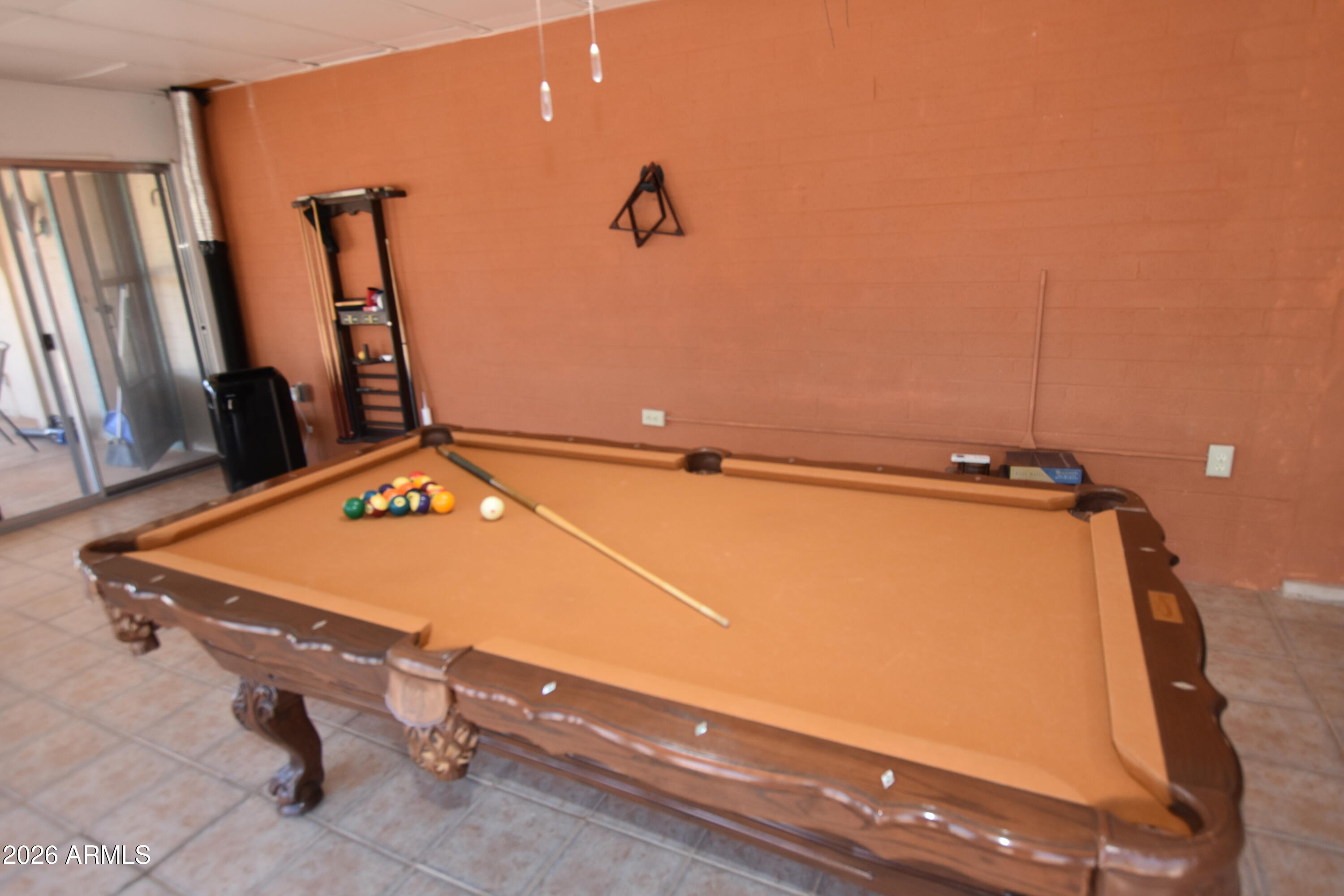 1140 West Briggs Road Ajo, AZ 85321 - Photo 4 of 42 a room with pool table and chair