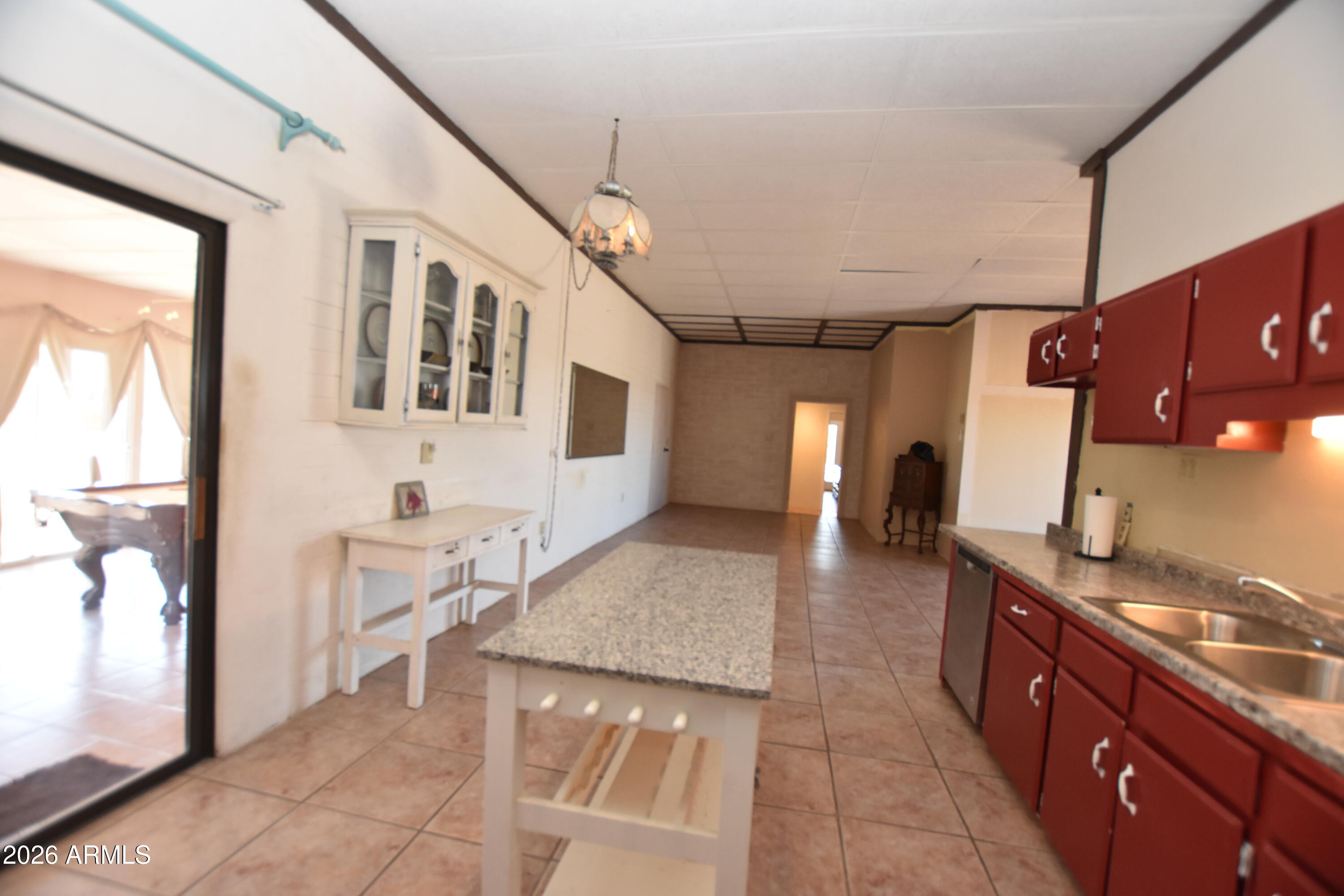 1140 West Briggs Road Ajo, AZ 85321 - Photo 10 of 42 a view of living room with granite countertop furniture and fireplace