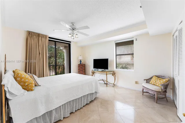 a bathroom with a sink toilet and mirror