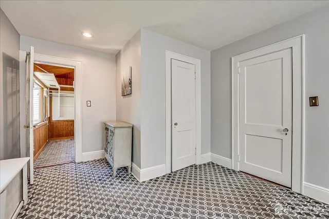 a view of a balcony with wooden floor
