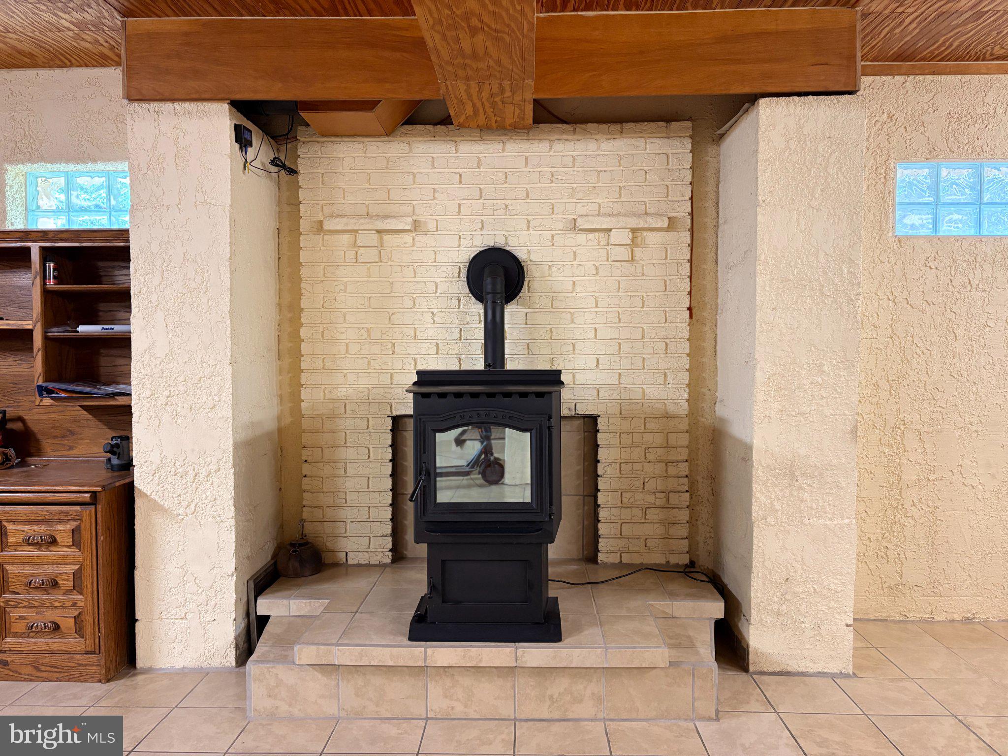 353 Jack Straw Road Julian, PA 16844 - Photo 23 of 40 Cozy hearth in a charming setting.
