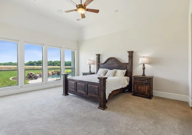 a bed room with a bed and a night stand