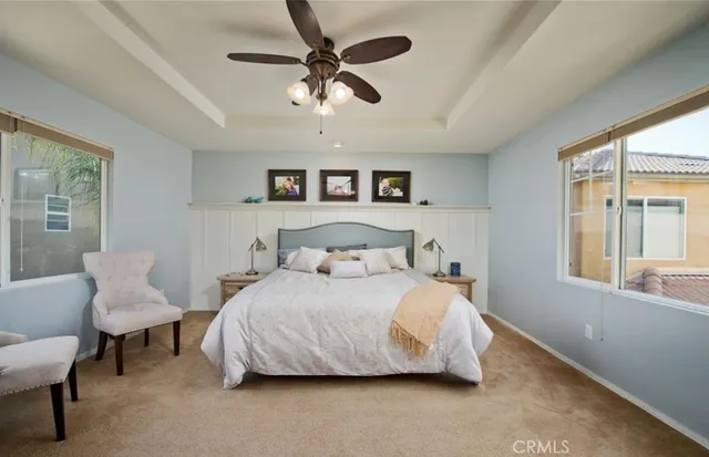 a bedroom with a bed furniture and a window