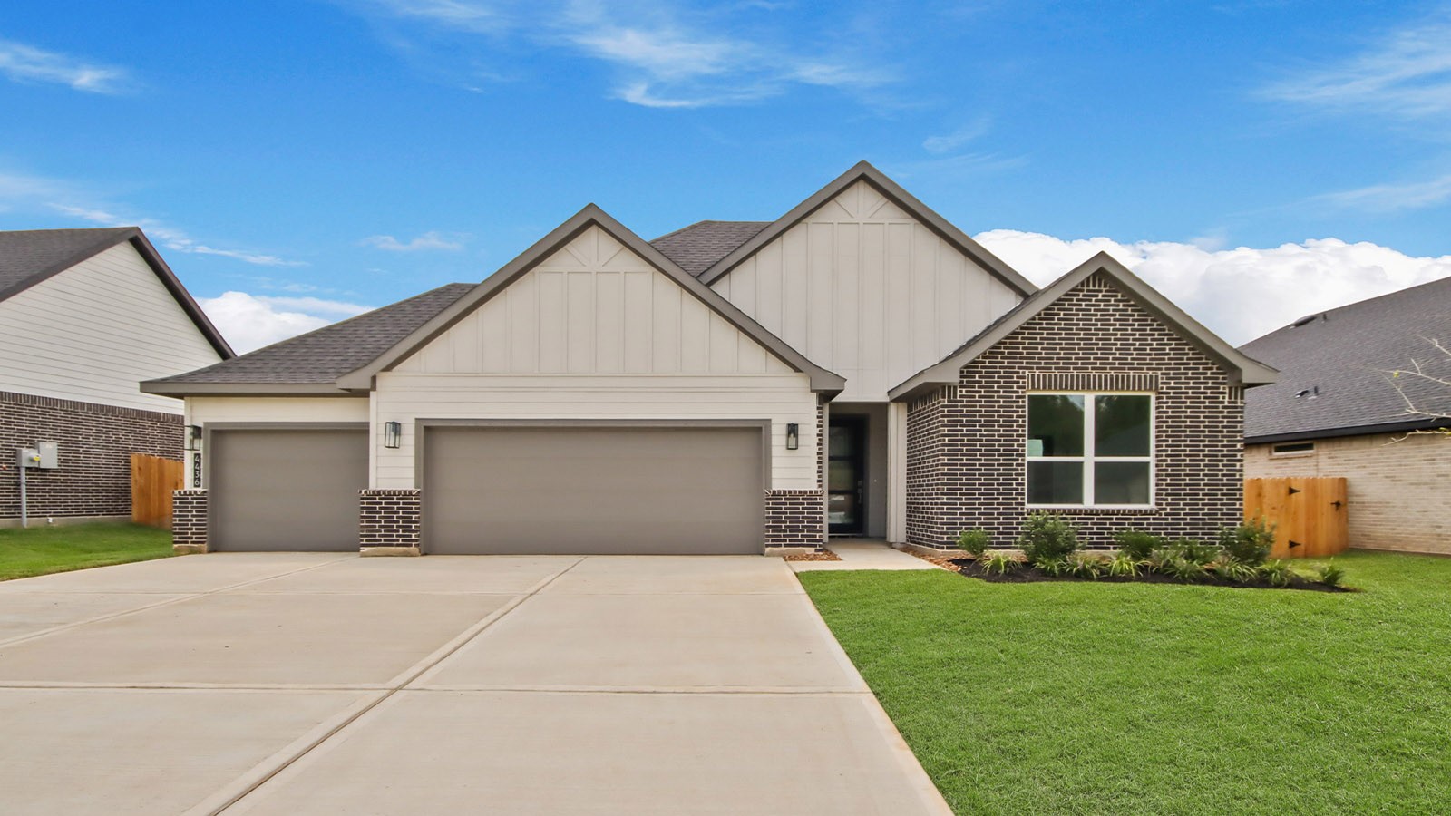 4436 Wapama Falls Loop Conroe, TX 77303 - Photo 1 of 39 a front view of house with yard and green space