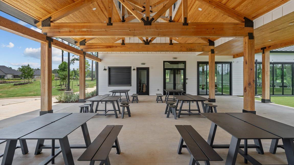 4436 Wapama Falls Loop Conroe, TX 77303 - Photo 11 of 39 a view of a patio with table and chairs
