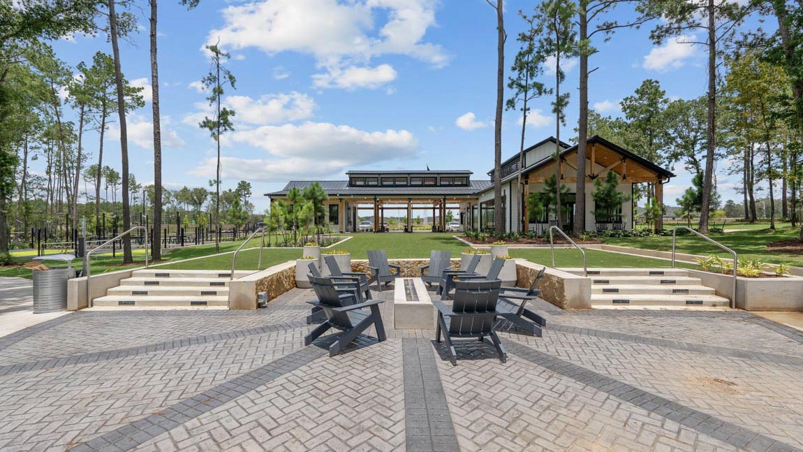 4436 Wapama Falls Loop Conroe, TX 77303 - Photo 14 of 39 a view of outdoor space yard deck patio and outdoor kitchen